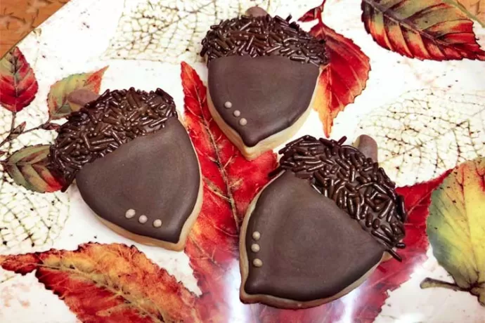 Acorn Cookie Trio nestled on a plate of Fall leaves