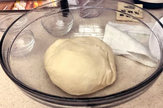 Time for the dough to rest and rise in a warm, moist place`